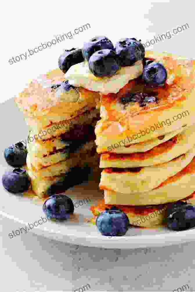 A Plate Of Fluffy Blueberry Pancakes Topped With Whipped Cream The Big Pancake Cookbook: Creative Pancakes That Are Perfect For Every Day