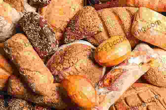 A Spread Of Various Types Of Bread, Including A Baguette, Sourdough Loaf, And Whole Wheat Bread THE BREAD MACHINE COOKBOOK FOR BEGINNERS: How To Have Fresh And Fragrant Bread Every Day 200+ Easy Recipes To Make Tasty Homemade Loaves And Snacks And A Master Baker Even If You Are A Beginne