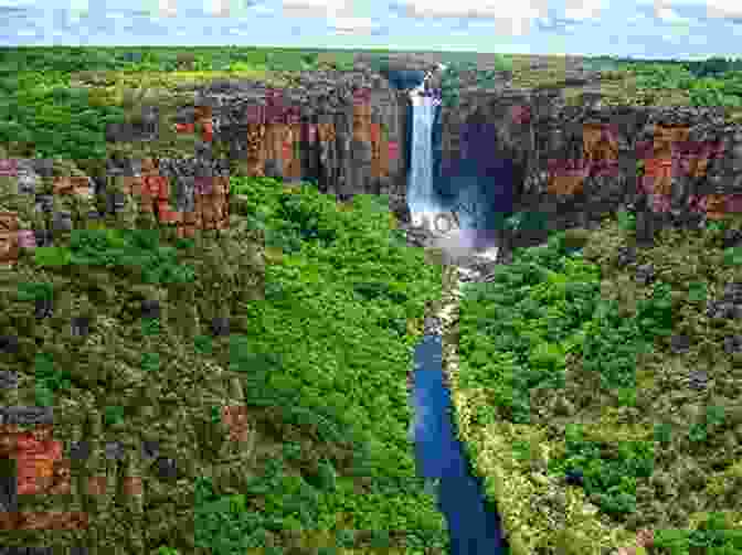 Aerial View Of Kakadu National Park, Showcasing Its Diverse Landscapes And Cascading Waterfalls. Lonely Planet South Australia Northern Territory (Travel Guide)