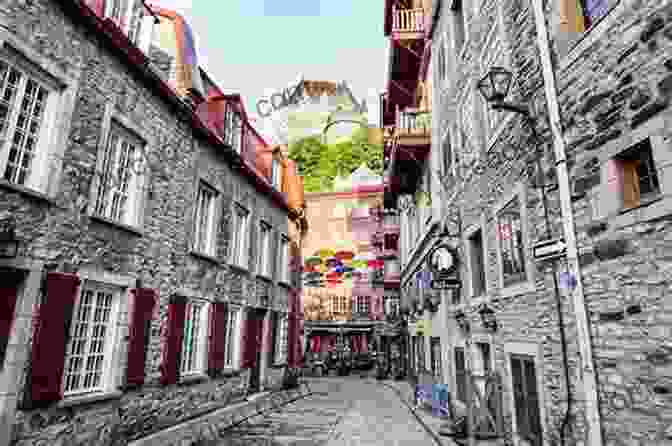 Charming Cobblestone Streets And Historic Buildings In Old Quebec City, Against The Backdrop Of The Towering Chateau Frontenac, Evoking The City's Rich French Heritage. Lonely Planet Best Of Canada (Travel Guide)