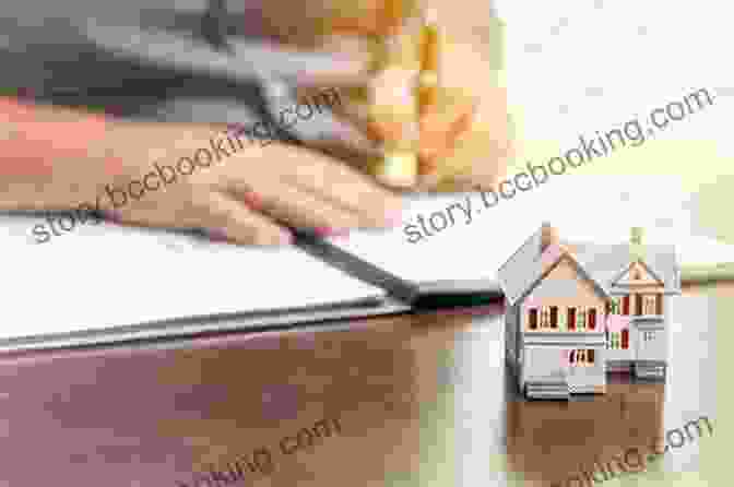 Close Up Of A Person Holding A Pen And Signing A Real Estate Contract How To Buy And Sell Real Estate In The Bahamas