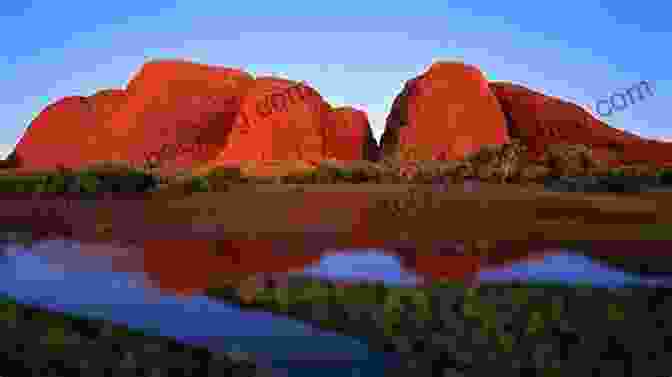 Kata Tjuta (The Olgas) At Sunset, With Warm Colors Illuminating The Rock Formations Australia: Red Centre Treks: Uluru (Ayers Rock) Kata Tjuta (the Olgas) And Watarrka (Kings Canyon) (Sian And Bob Pictorial Guides)