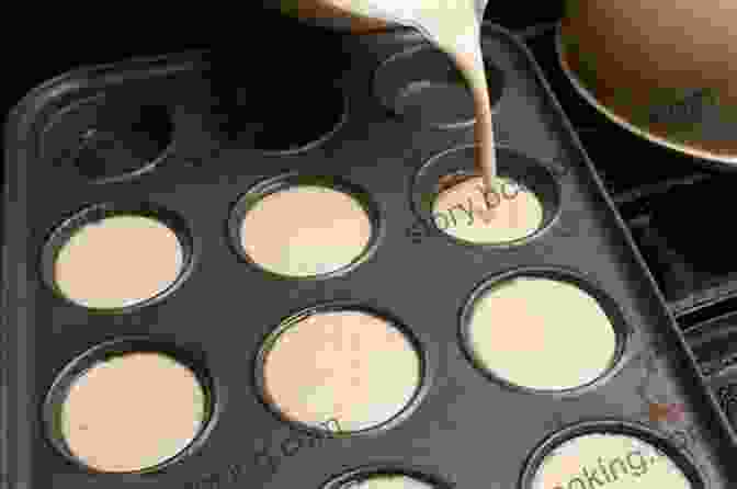 Muffin Batter Being Poured Into A Muffin Tin Bread Baking Cookbook: Delicious Homemade Bread And Muffin Recipes For Beginners