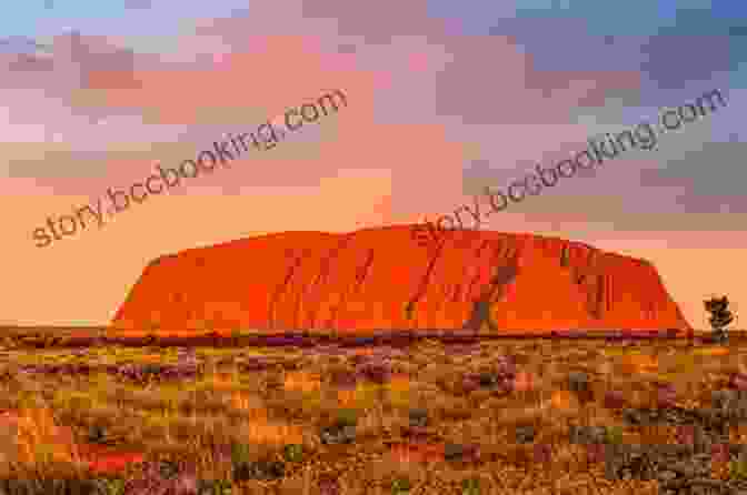 Uluru (Ayers Rock),A Majestic Sandstone Monolith, Bathed In The Golden Light Of Sunset. Lonely Planet South Australia Northern Territory (Travel Guide)